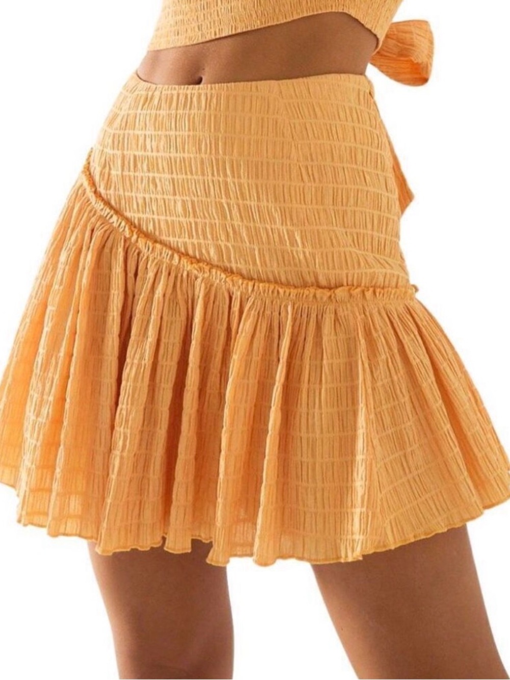 Flared Smocked Mini Skirt in Peach Yellow
